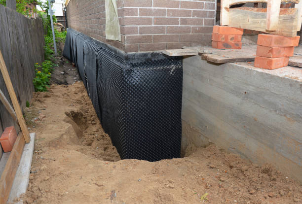 Happy homeowners after waterproofing job in Columbia Station